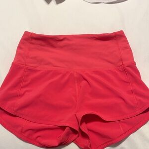 Pink Lululemon speed ups shorts